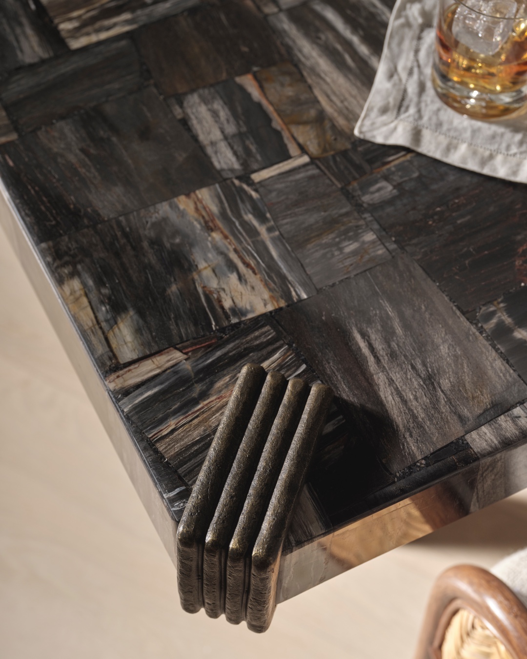 The Gibbon’s Feast Bistro Table is an expression of materiality and craftsmanship that embodies the iconic vision of Bill Bensley. Brass finish legs in an angular hourglass shape support a black petrified wood top. The table’s metal detailing resembles the hands of a gibbon wrapping around corners. Visit the link in our bio for more information. #ThisIsMcGuire #BillBensley