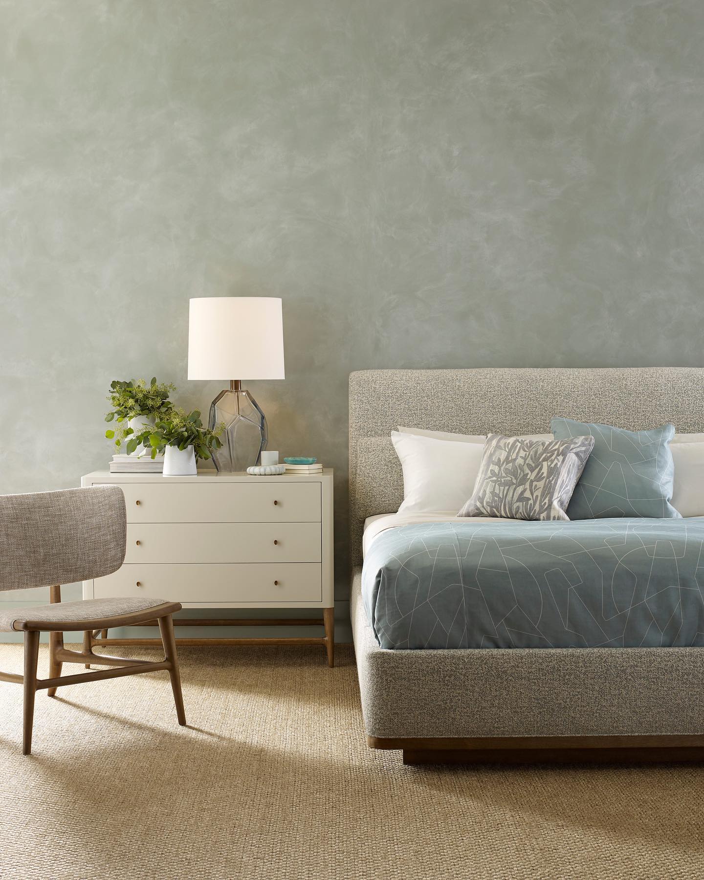 The Sublime Bed invites repose. The headboard and decking are upholstered with a fully veneered walnut back and walnut base allowing the bed to float in the room. A generously scaled bolster is included. Also featuring the Radius Nightstand from our Barbara Barry collection. Visit the link in our bio for more information. #BarbaraBarryForMcGuire