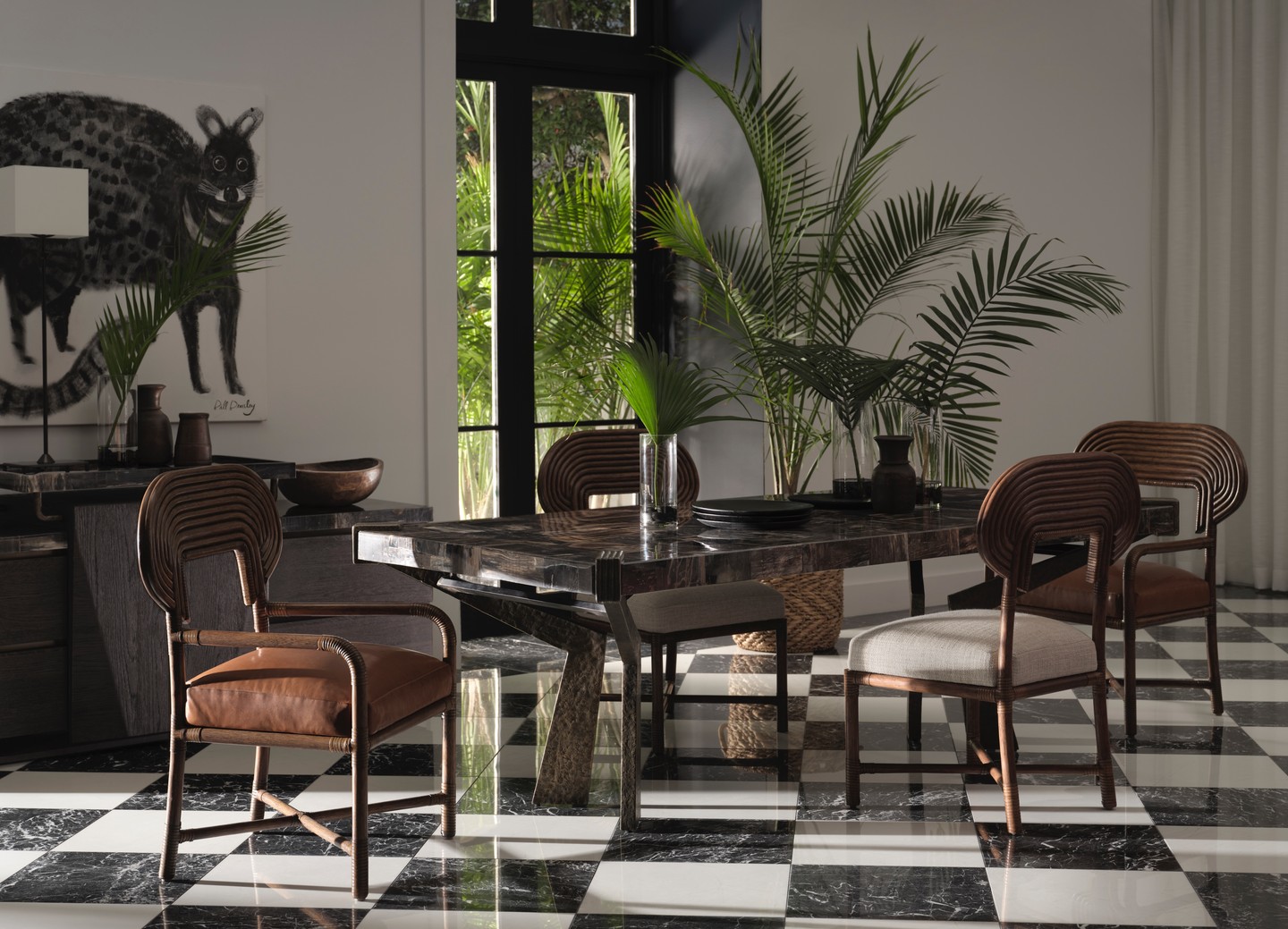 The Bill Bensley Collection featuring The Gibbon's Feast Dining Table, The Kouprey's Credenza, The Terrapin's Arm Chair, and The Terrapin's Side Chair. Visit the link in our bio for more information. #ThisIsMcGuire #BillBensley